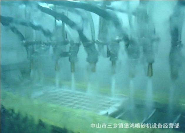 输送式自动喷砂机