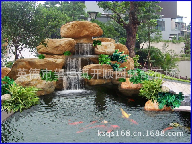 专业设计、制造大小黄腊石假山、黄蜡石鱼池水景