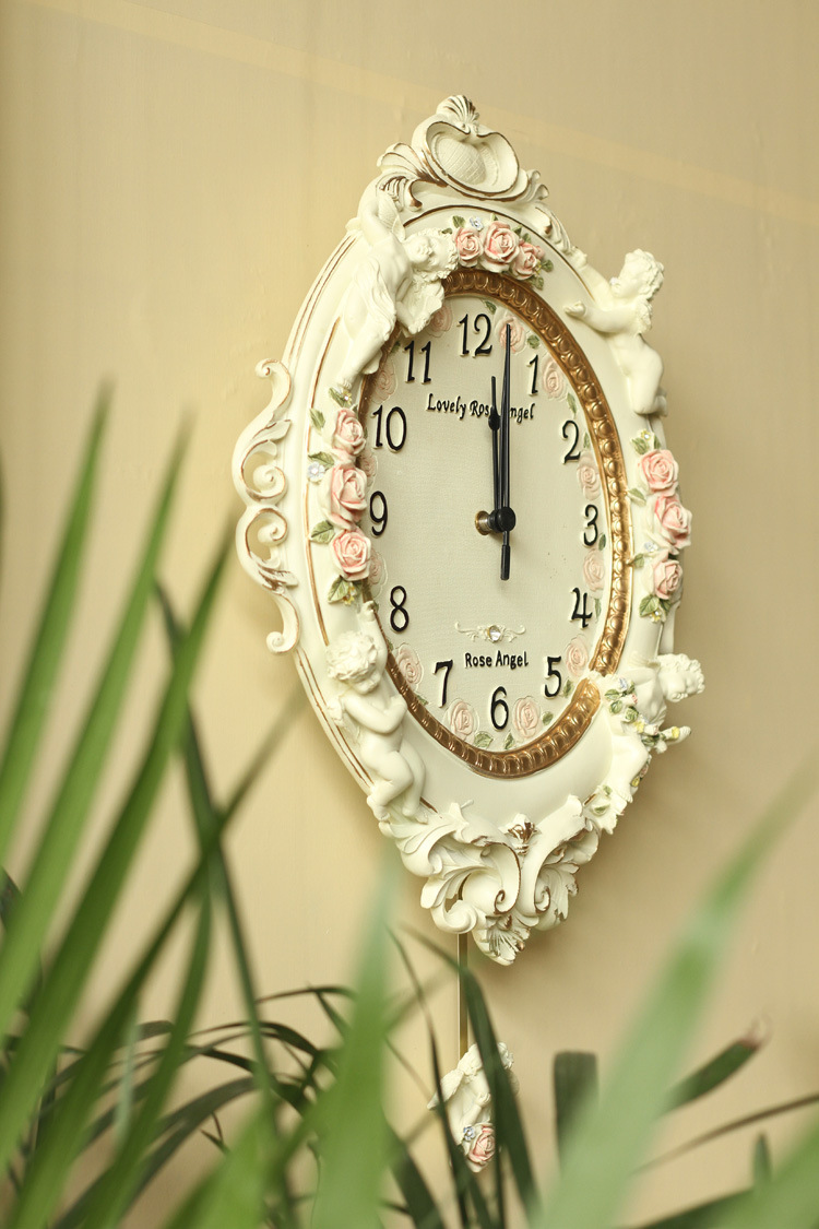 欧式宫廷风格挂钟 天使浮雕树脂工艺挂钟 客厅静音钟批发