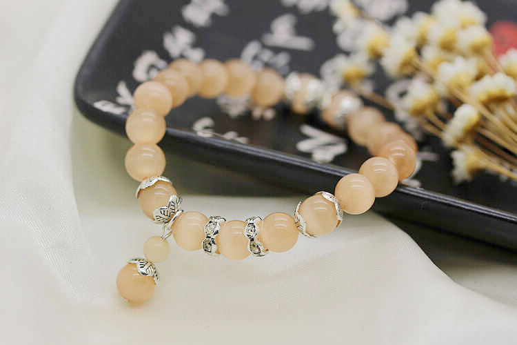 韩版时尚8mm香槟色猫眼石女款手链情侣手串精品两元店货源批发