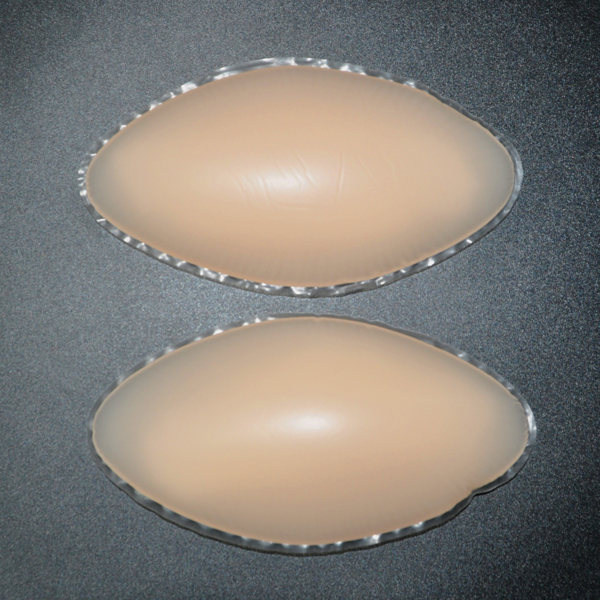 厂家批发胸垫硅胶义乳聚拢丰胸硅胶义乳尖形插片 提胸增大内衣垫