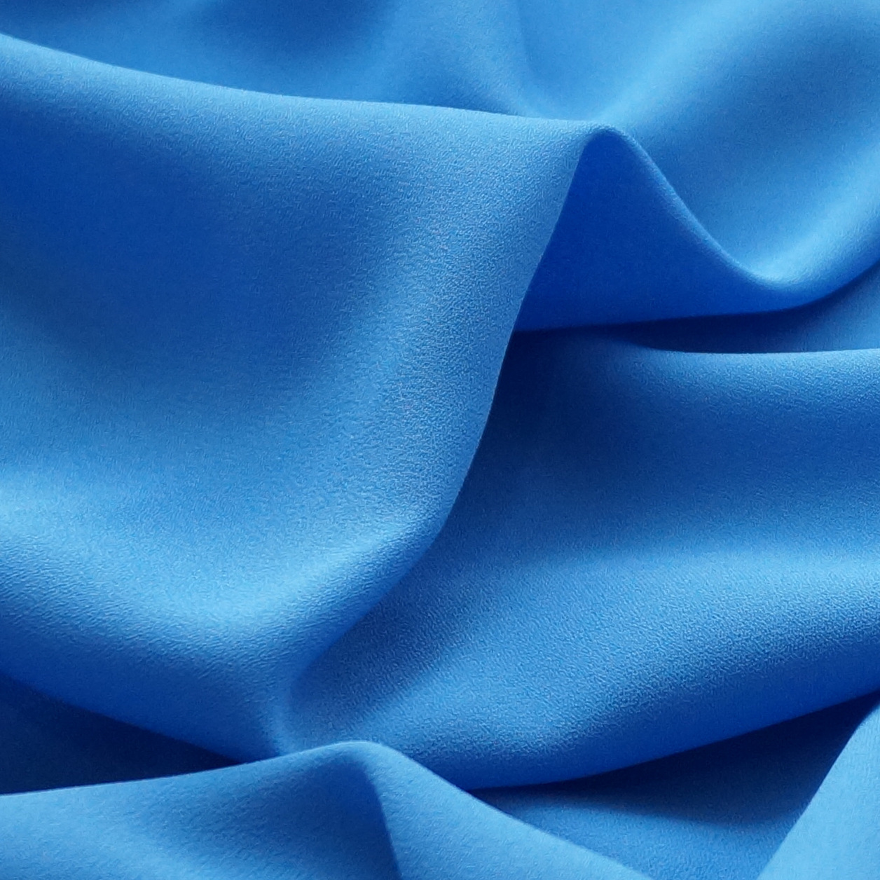 涤纶化纤梭织加厚阳光麻雪纺面料女装时尚面料批发