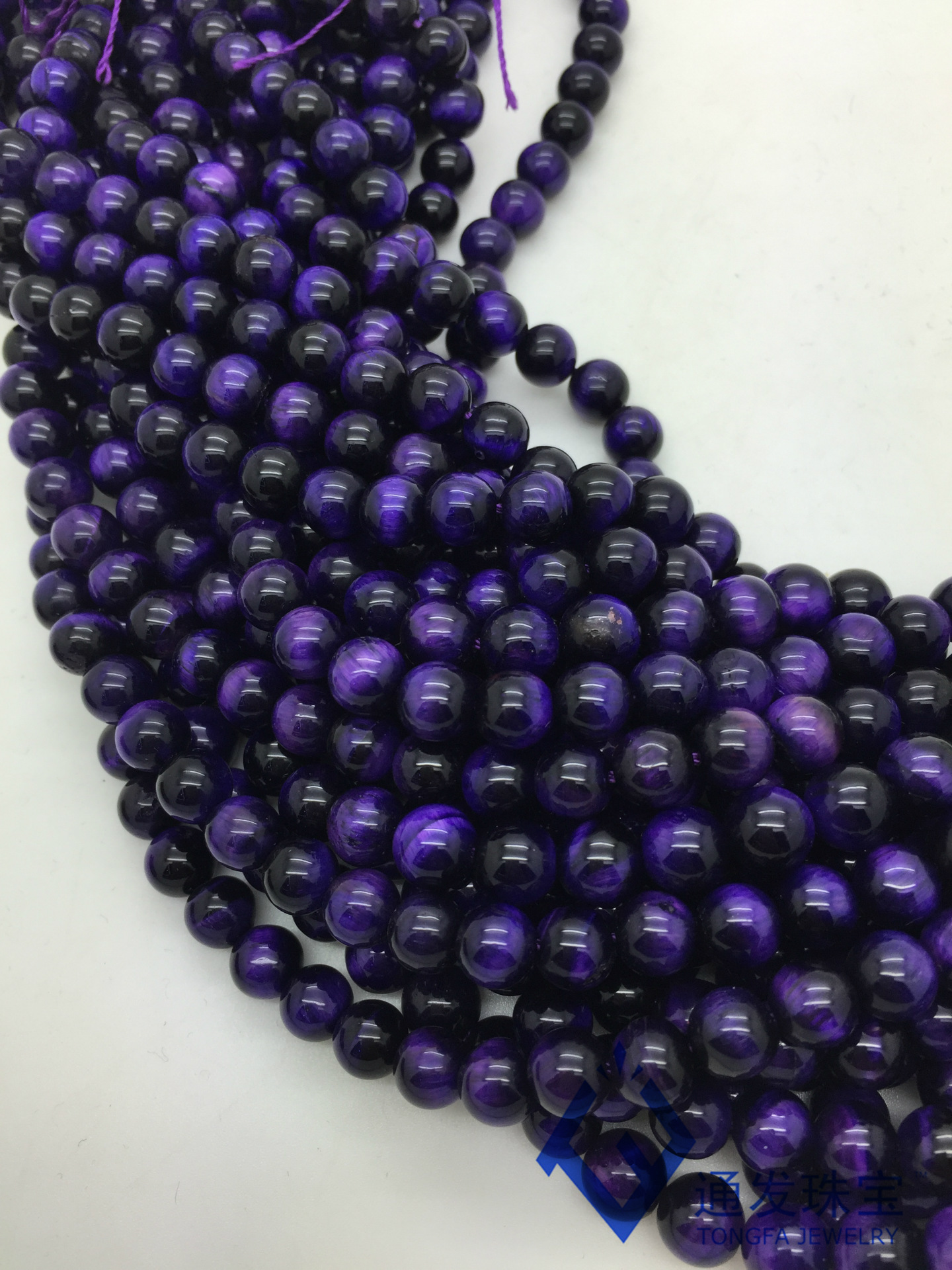 通发珠宝a级紫色虎眼石,招财辟邪,虎眼石diy半成品批发!